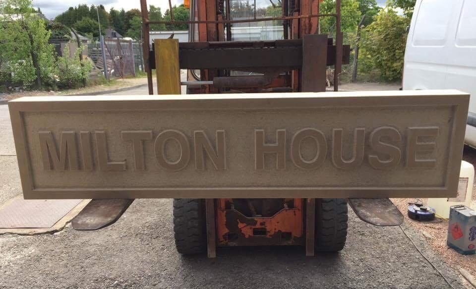 house name carving