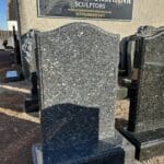 Cruickshank sculptors blue pearl rope headstone