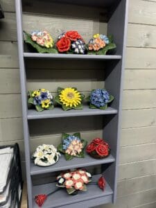 shelf of flower ornements